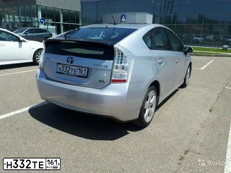 Фото автомобиля TOYOTA PRIUS, 2009 — госномер В100ТВ123. Цвет: Серый