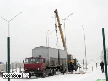 Фото автомобиля FREIGHTLINER ARGOSY, 1999 — госномер К057ХС70. Цвет: Белый