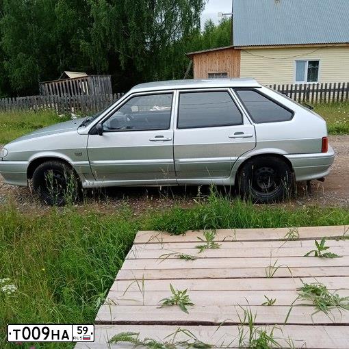 Фото автомобиля LADA 2121 NIVA, 2002 — госномер Т009НА59. Цвет: ФИОЛЕТОВЫЙ