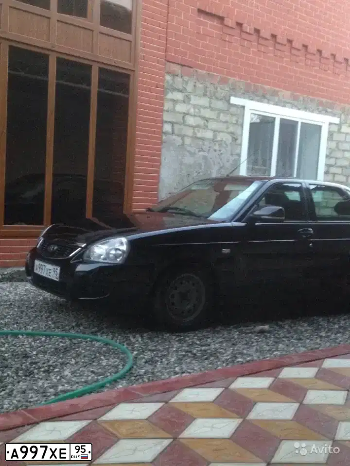 Фото автомобиля LADA 2170 PRIORA, 2009 — госномер Н636МТ15. Цвет: Темно-зеленый