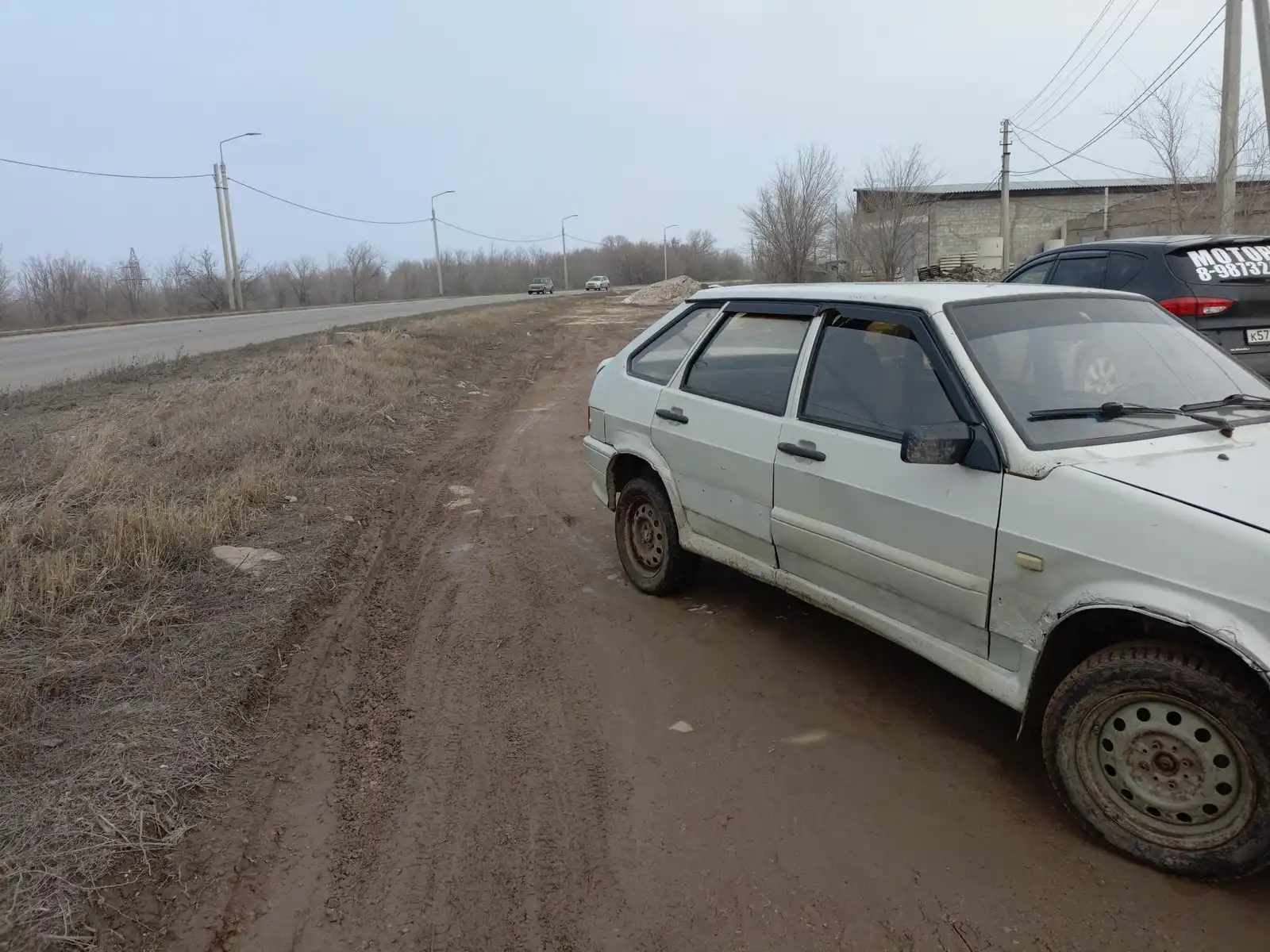 Фото автомобиля LADA 2121 NIVA, 2001 — госномер В439ТО164. Цвет: ФИОЛЕТОВЫЙ