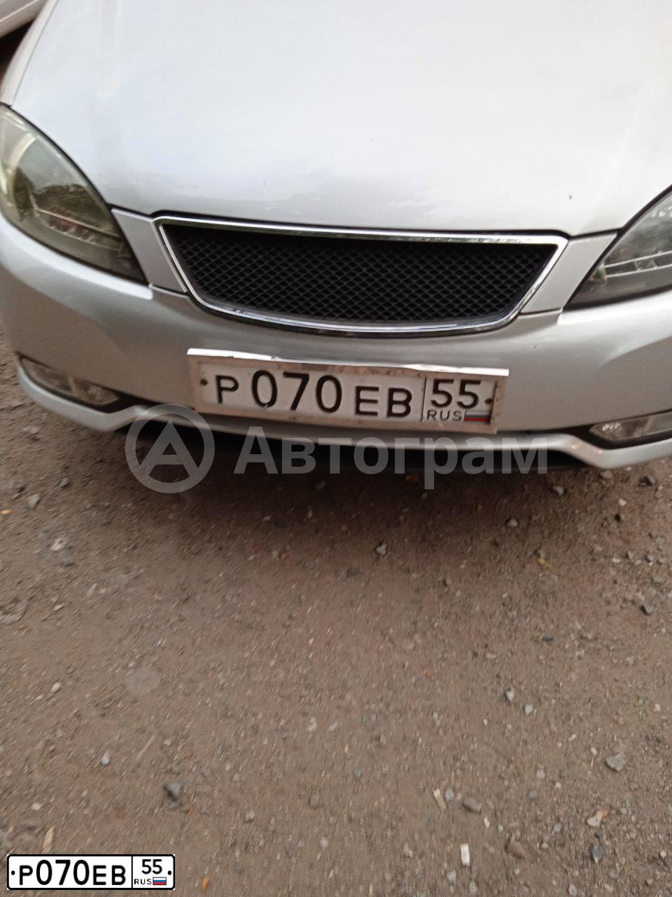 Фото автомобиля DAEWOO GENTRA, 2015 — госномер В932АК155. Цвет: СЕРЕБРИСТЫЙ