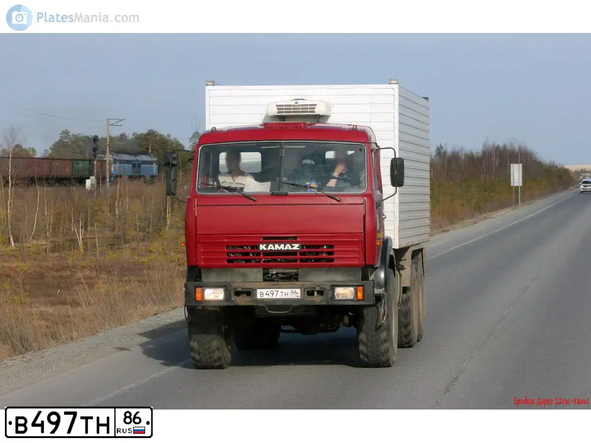 Фото автомобиля KAMAZ 4311, 2007 — госномер В794ТТ186. Цвет: Красный