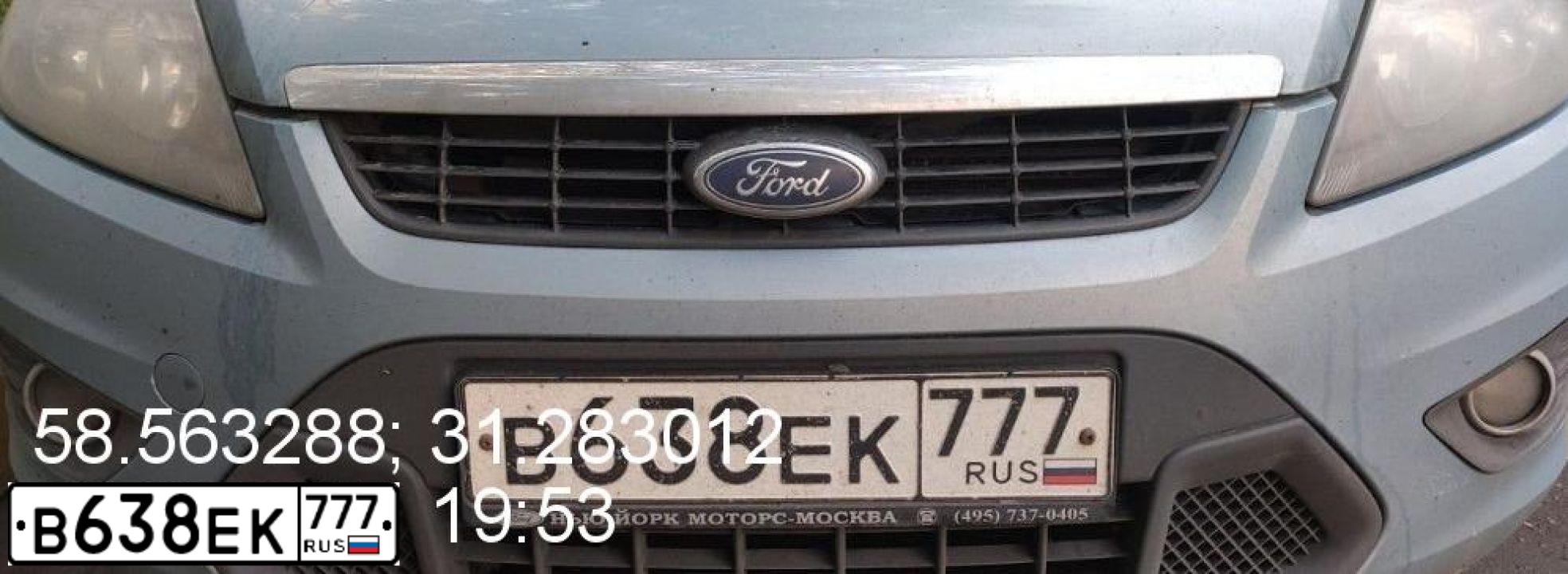 Фото автомобиля FORD FOCUS, 2009 — госномер Е274РН790. Цвет: Серый