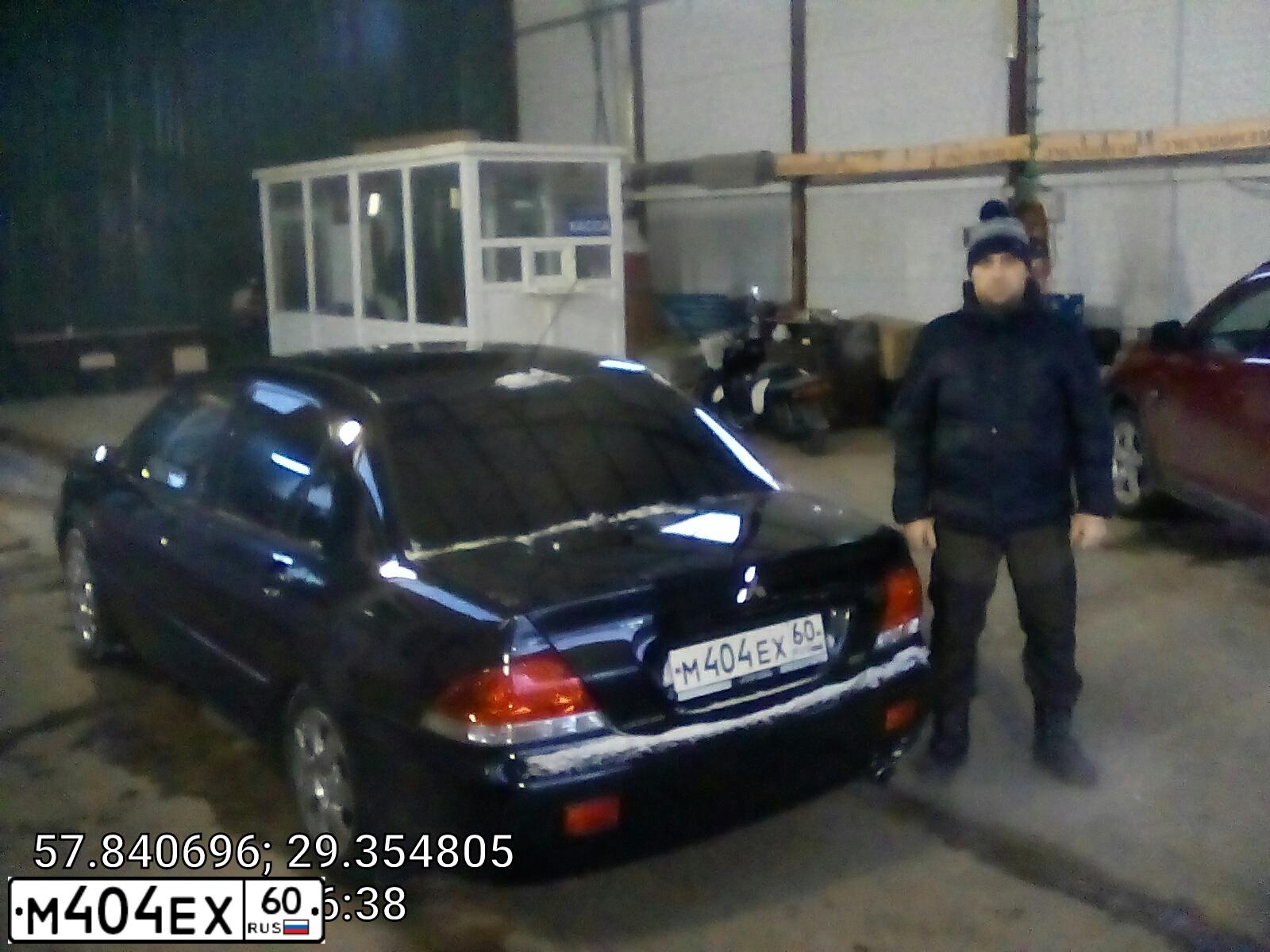 Фото автомобиля MITSUBISHI LANCER, 2007 — госномер М404ЕХ60. Цвет: ЧЕРНЫЙ