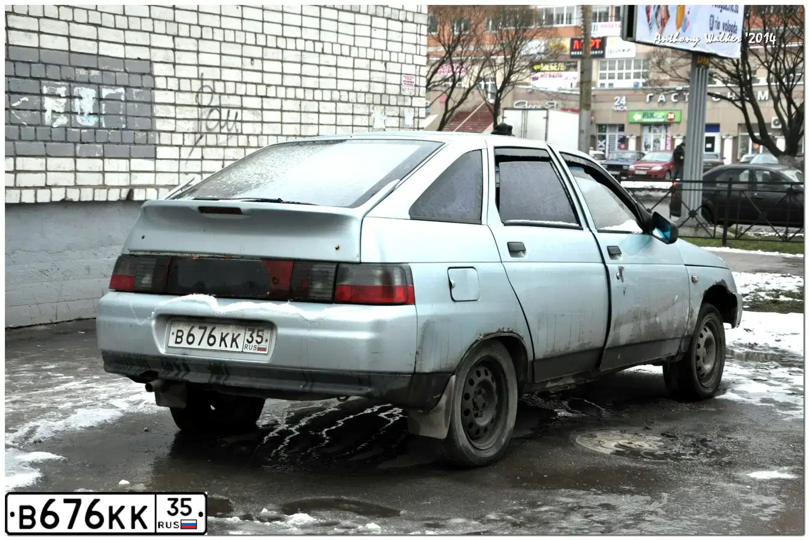 Фото автомобиля LADA 2112, 2002 — госномер В676КК35. Цвет: СЕРЕБРИСТО-ГОЛУБОЙ