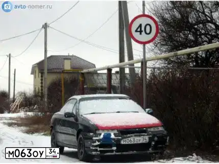 Фото автомобиля OPEL CALIBRA, 1991 — госномер Е898АХ761. Цвет: ЧЕРНЫЙ