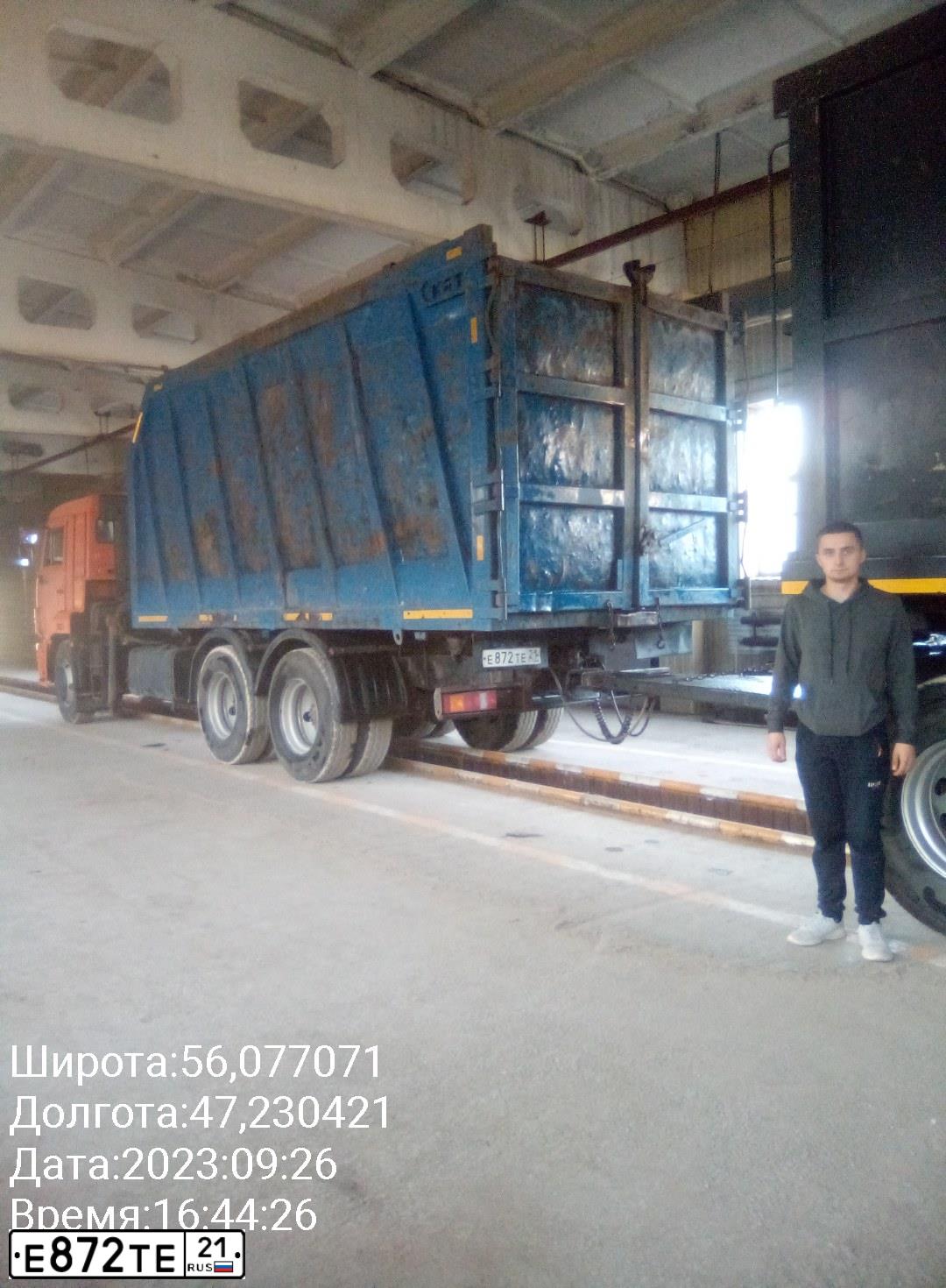Фото автомобиля KAMAZ 65115 /6X4/, 2017 — госномер Е872ТЕ21. Цвет: ОРАНЖЕВЫЙ RAL 2009