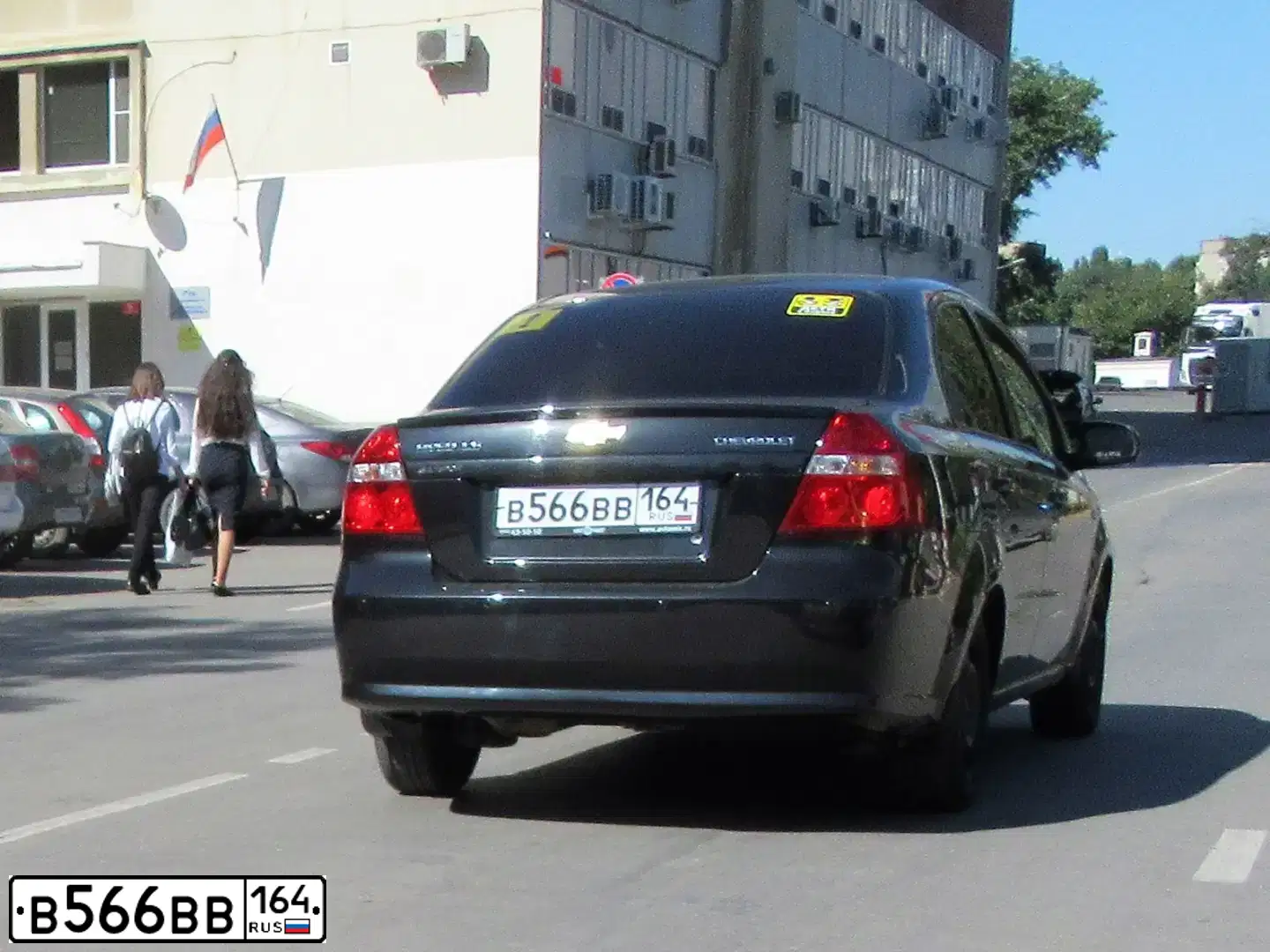 Фото автомобиля CHEVROLET AVEO, 2011 — госномер Х113РХ64. Цвет: ЧЕРНЫЙ