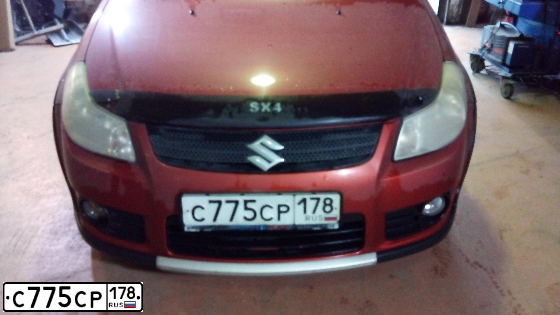 Фото автомобиля SUZUKI SX 4, 2008 — госномер С775СР178. Цвет: ОРАНЖЕВЫЙ