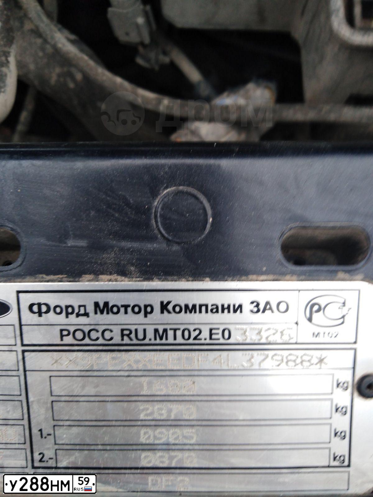 Фото автомобиля FORD FOCUS, 2004 — госномер О171ХА774. Цвет: ЧЕРНЫЙ