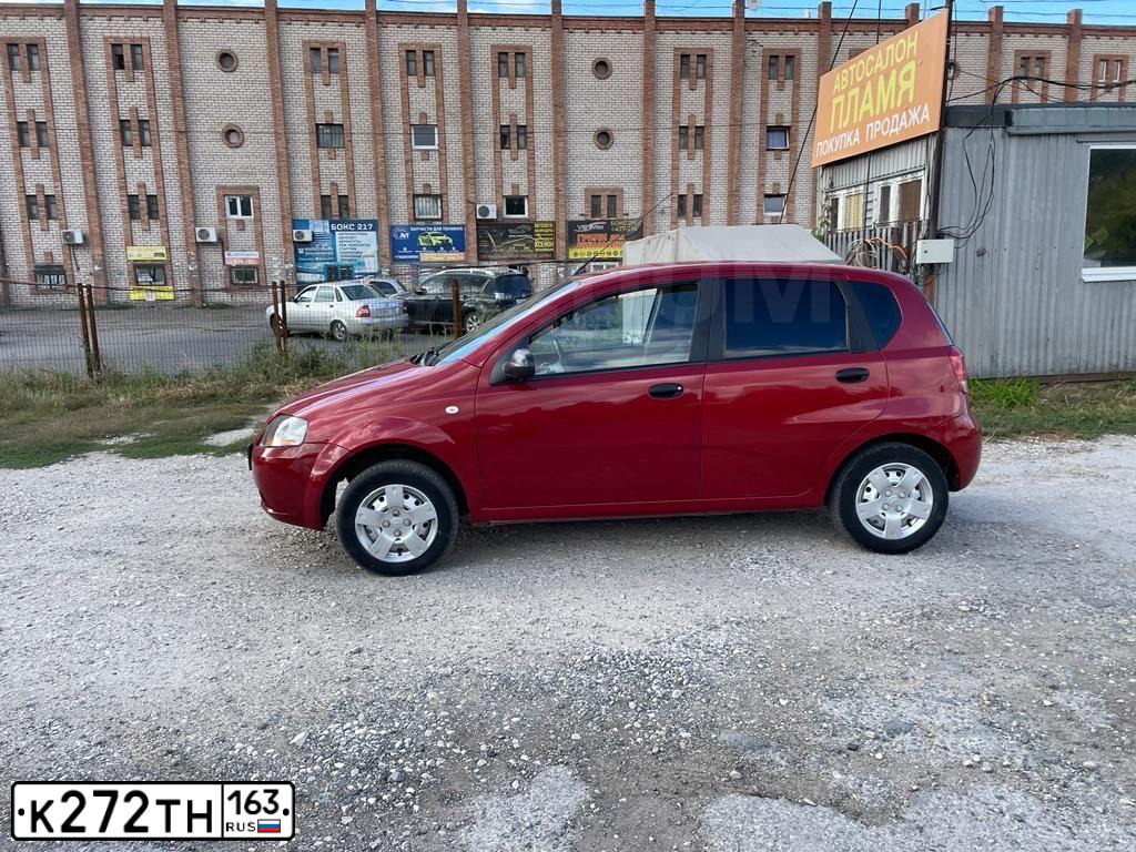 Фото автомобиля CHEVROLET AVEO, 2007 — госномер М560НВ763. Цвет: Красный