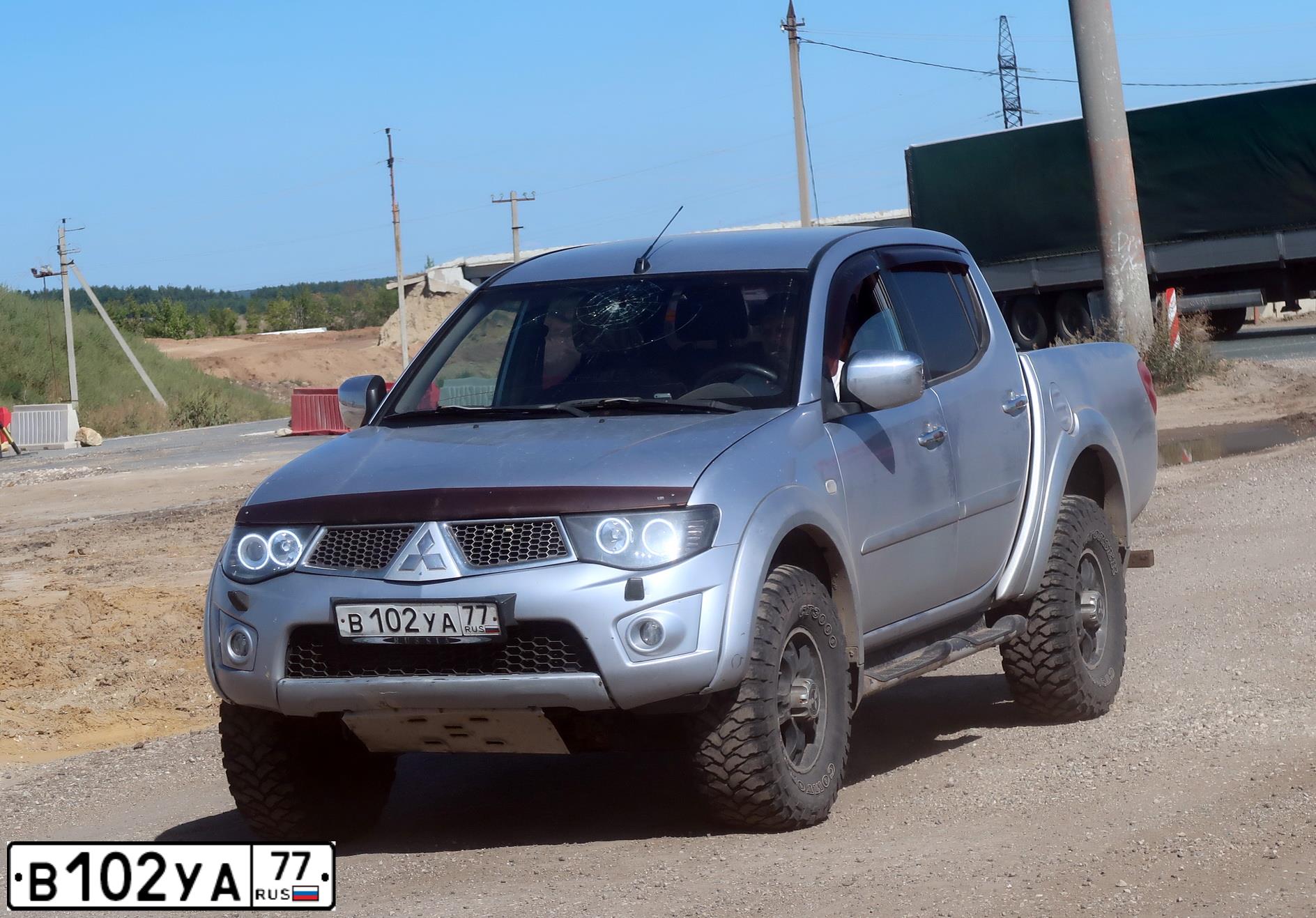 Фото автомобиля LADA 2110, 1997 — госномер Е795РН90. Цвет: КРАСНЫЙ