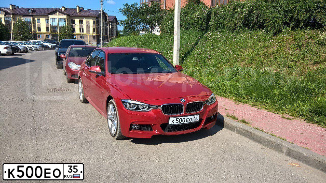 Фото автомобиля BMW SERIE 3, 2018 — госномер К500ЕО35. Цвет: КРАСНЫЙ