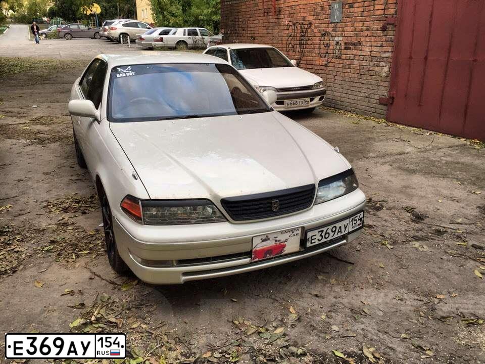 Фото автомобиля LADA 2192 KALINA, 2014 — госномер Е389АУ154. Цвет: СЕРЕБРИСТЫЙ