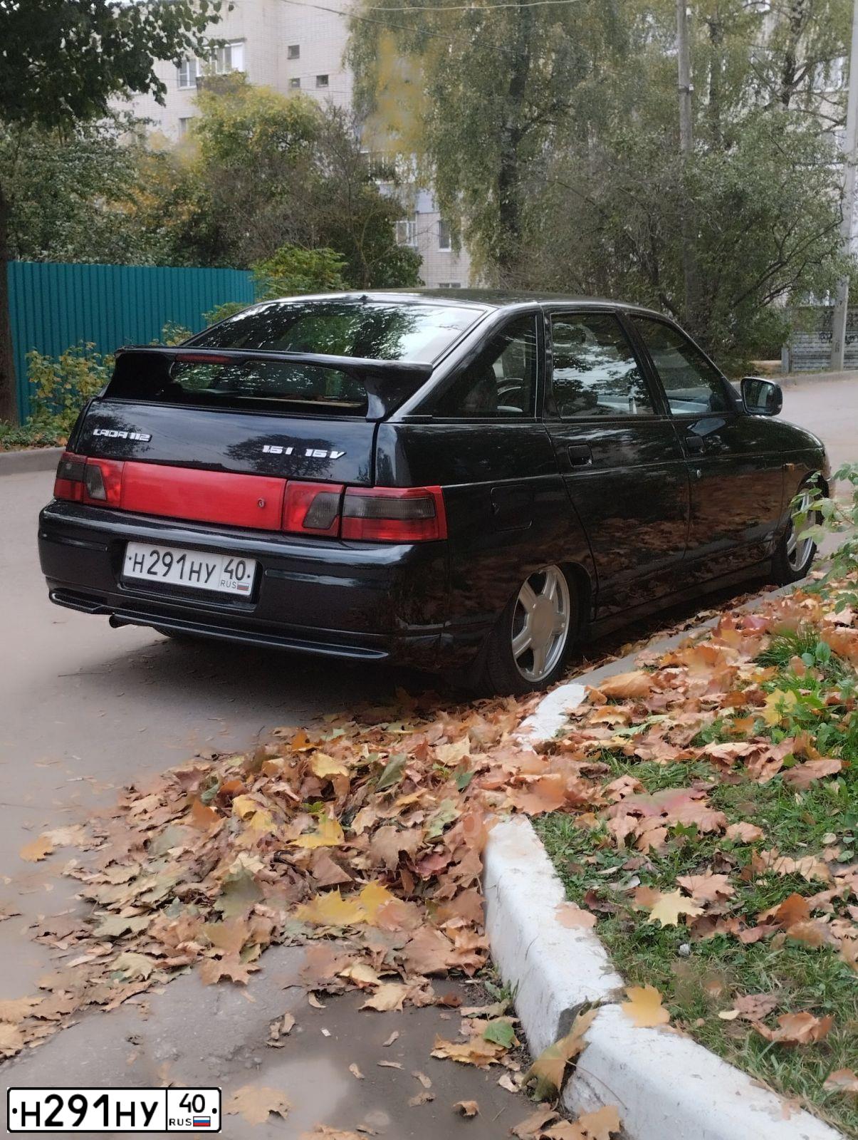 Фото автомобиля VAZ 2112 LADA, 2007 — госномер Н291НУ40. Цвет: ЧЕРНЫЙ