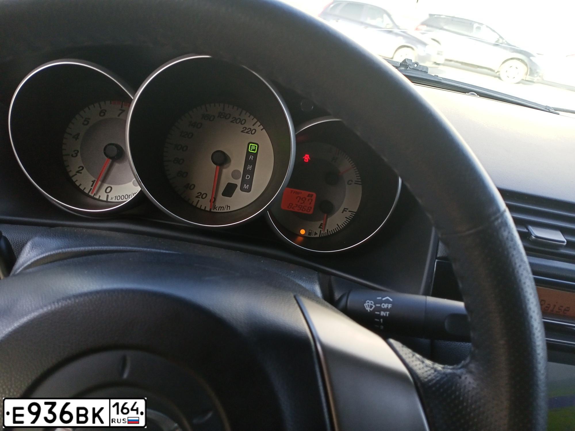 Фото автомобиля MAZDA 3, 2006 — госномер Н720КА98. Цвет: ТЕМНО-ВИШНЕВЫЙ