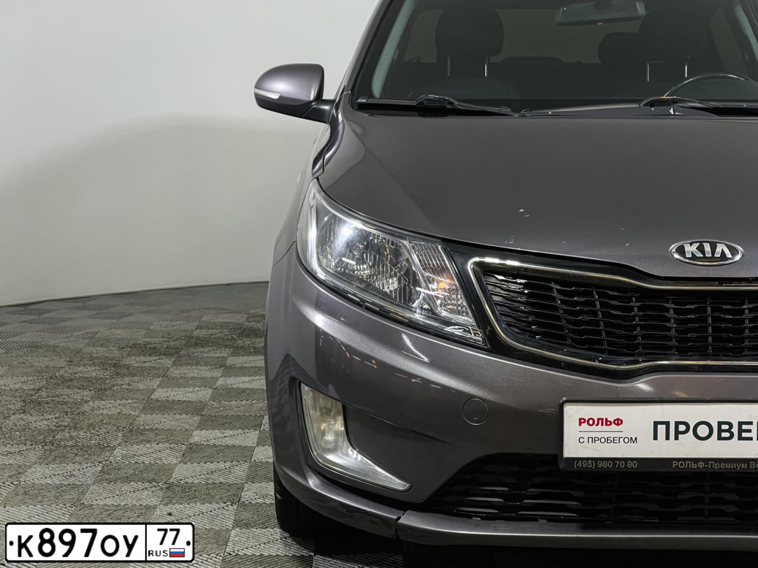 Фото автомобиля KIA RIO, 2013 — госномер Е829ЕО550. Цвет: СЕРЫЙ