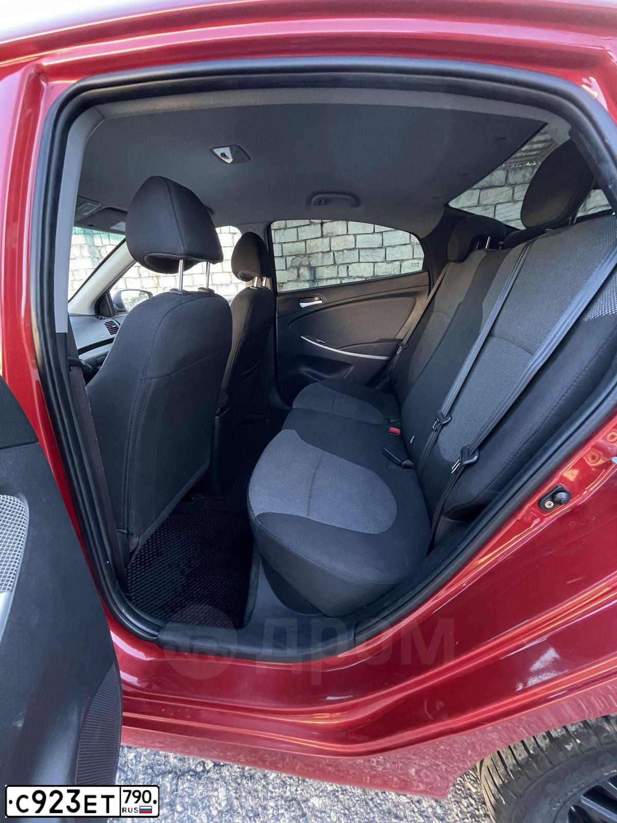 Фото автомобиля HYUNDAI SOLARIS, 2013 — госномер Е268КН21. Цвет: Красный