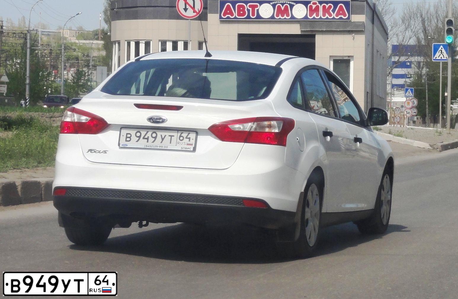 Фото автомобиля FORD FOCUS, 2013 — госномер В949УТ64. Цвет: БЕЛЫЙ