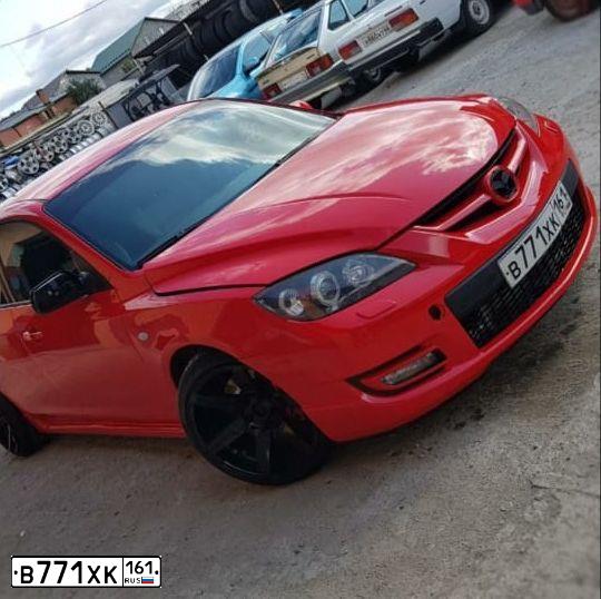 Фото автомобиля MAZDA 3, 2006 — госномер В771ХК161. Цвет: Красный