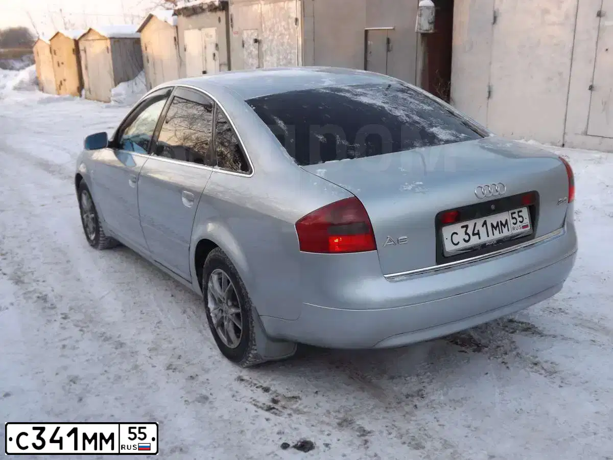 Фото автомобиля AUDI A6, 1997 — госномер Р304ВУ55. Цвет: СВЕТЛО-СЕРЫЙ