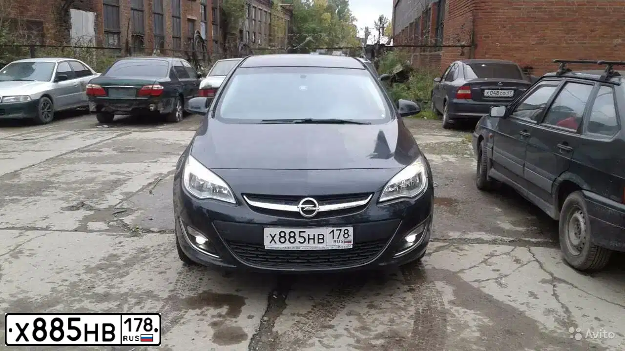 Фото автомобиля OPEL ASTRA, 2011 — госномер Х885НВ178. Цвет: ЧЕРНЫЙ