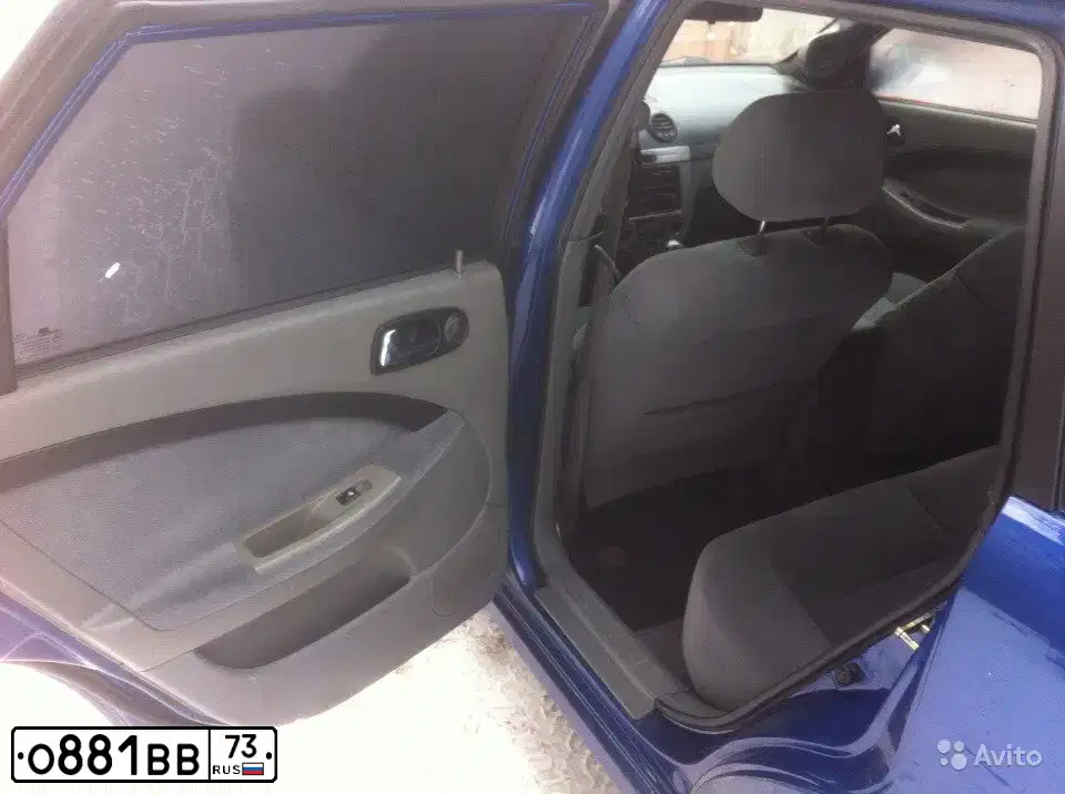Фото автомобиля CHEVROLET LACETTI, 2006 — госномер Р303НС05. Цвет: синий