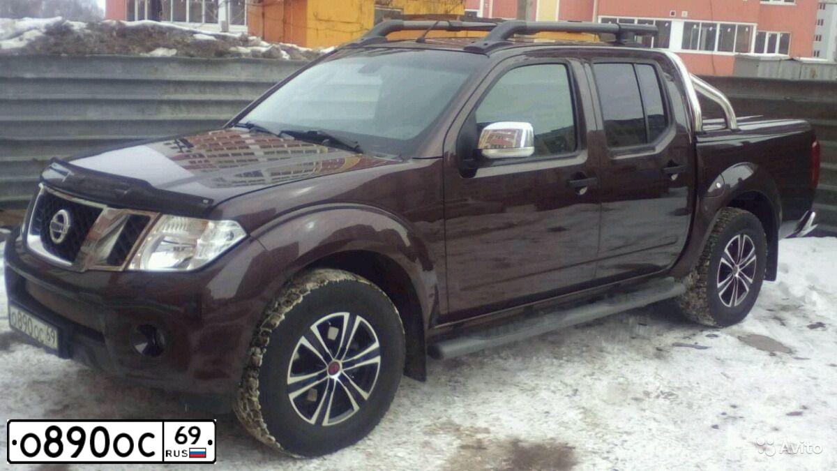 Фото автомобиля NISSAN NAVARA, 2012 — госномер В869АВ252. Цвет: Коричневый