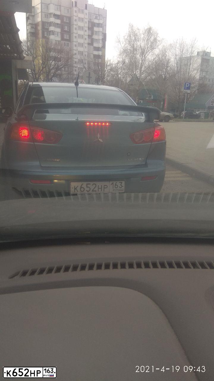 Фото автомобиля MITSUBISHI LANCER, 2008 — госномер К652НР163. Цвет: СВЕТЛО-СЕРО-ЗЕЛЕНЫЙ