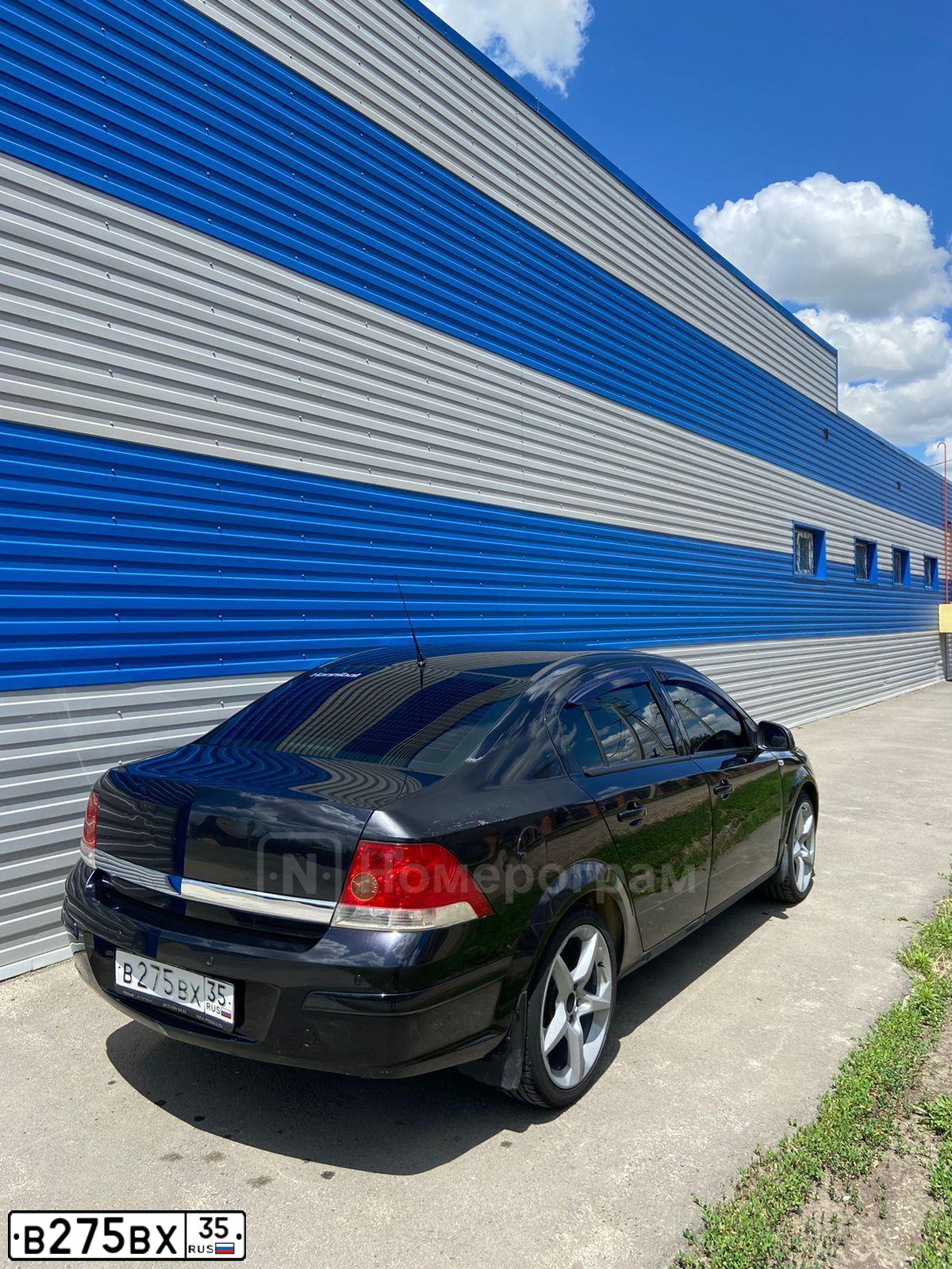 Фото автомобиля OPEL ASTRA, 2010. Цвет: ЧЕРНЫЙ