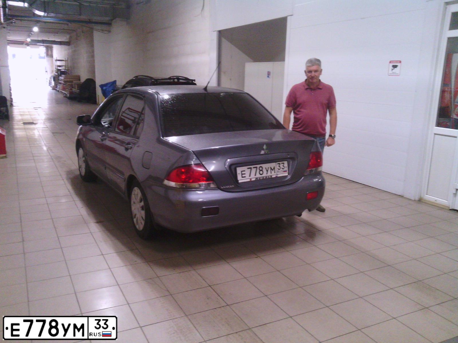 Фото автомобиля MITSUBISHI LANCER, 2009 — госномер Х843ТМ790. Цвет: СЕРЫЙ