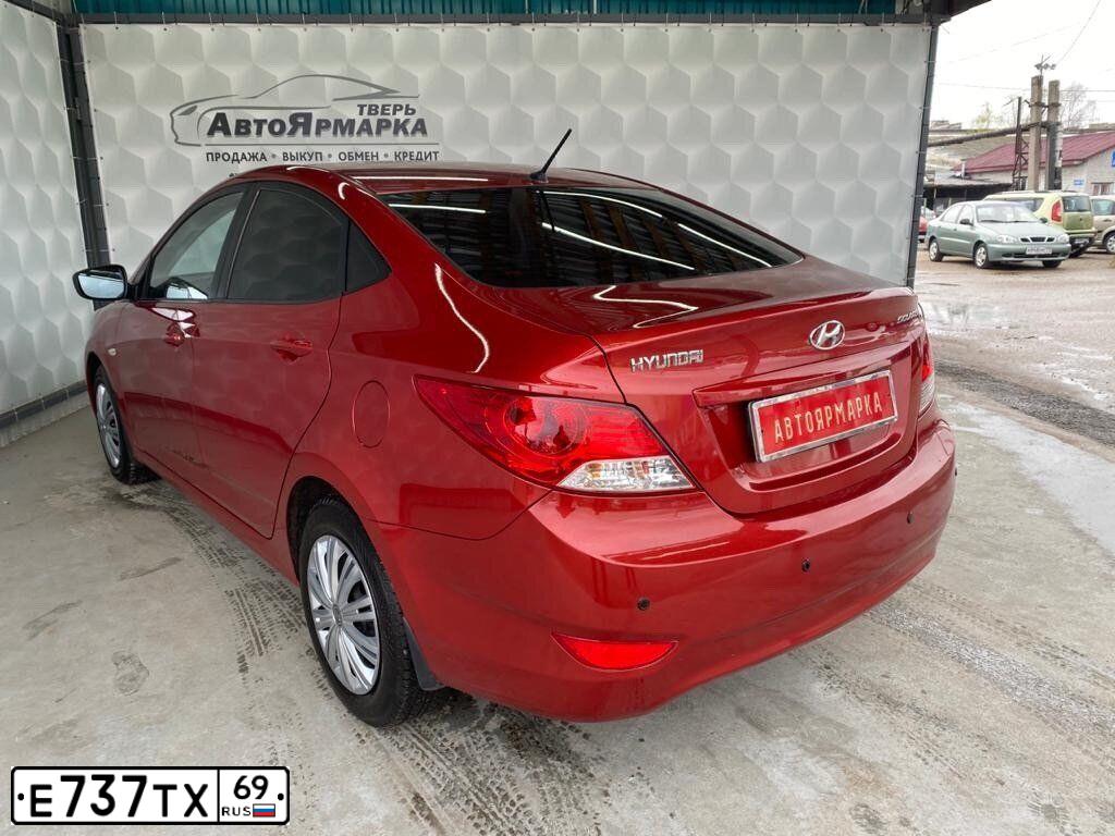Фото автомобиля HYUNDAI SOLARIS, 2011 — госномер К973ВТ53. Цвет: КРАСНЫЙ ГРАНАТ