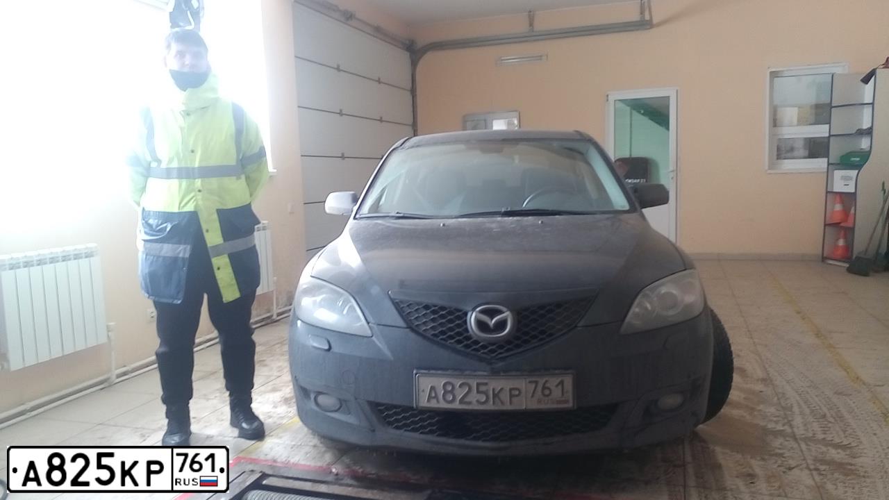 Фото автомобиля MAZDA 3, 2008 — госномер Х123АМ31. Цвет: ЧЕРНЫЙ