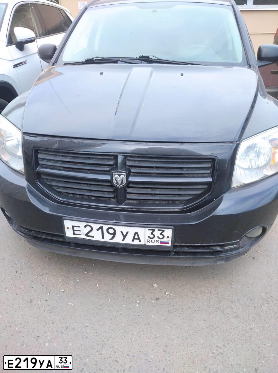 Фото автомобиля DODGE CALIBER, 2007 — госномер Е219УА33. Цвет: ЧЕРНЫЙ