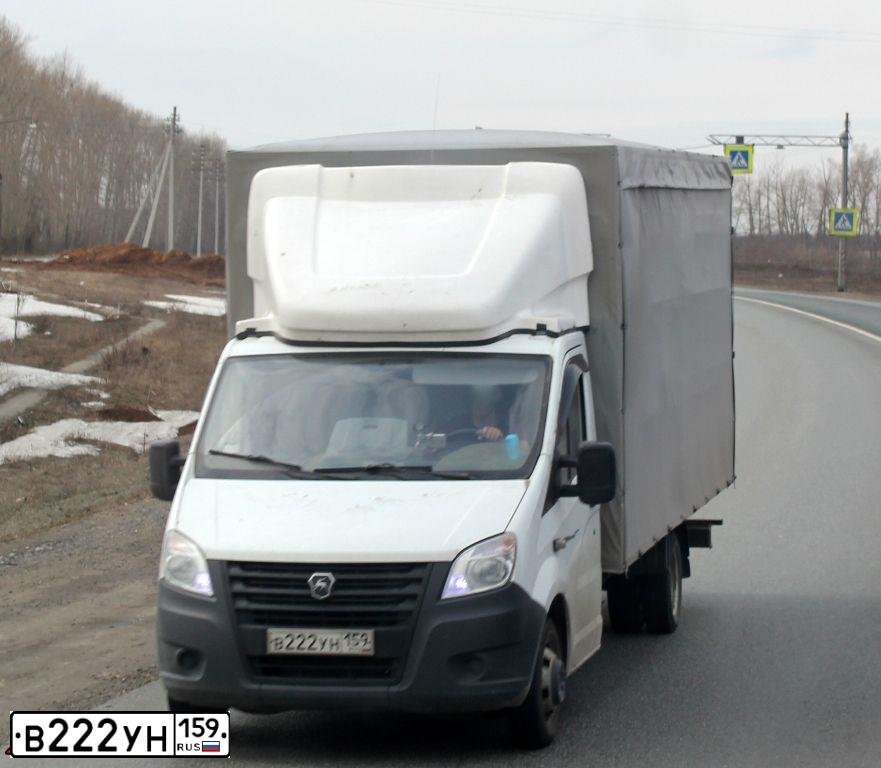 Фото автомобиля MITSUBISHI LANCER, 2006 — госномер В222УН159. Цвет: Серый