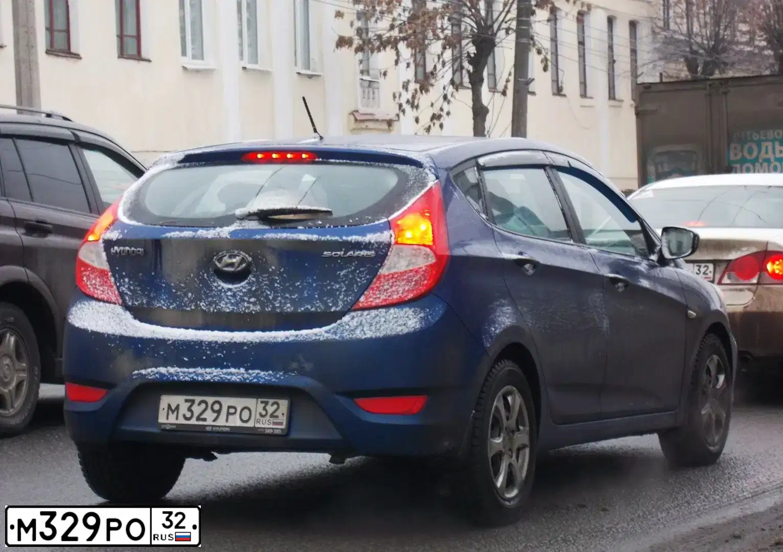 Фото автомобиля HYUNDAI SOLARIS, 2013 — госномер М329РО32. Цвет: ТЕМНО-СИНИЙ