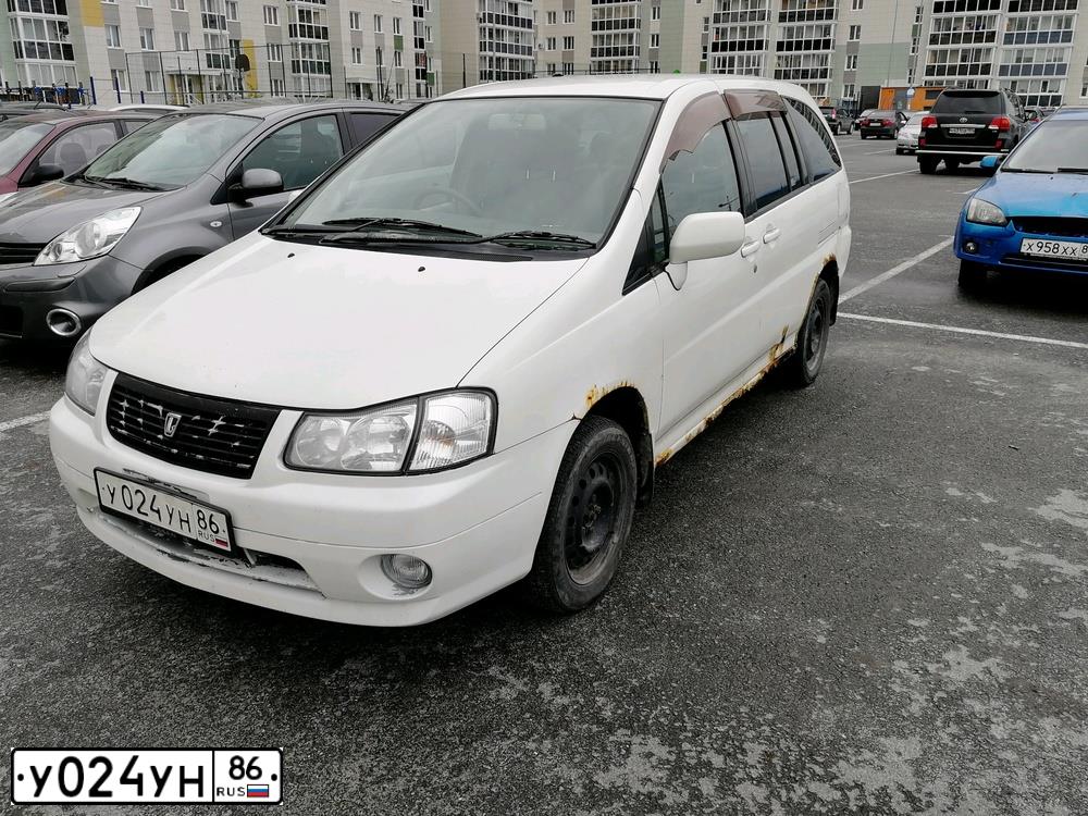 Фото автомобиля NISSAN LIBERTY, 1999 — госномер Х486АК55