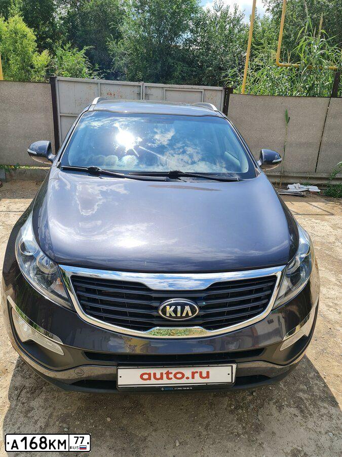 Фото автомобиля KIA SPORTAGE, 2013 — госномер А168КМ77. Цвет: СЕРЫЙ