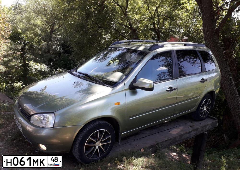 Фото автомобиля LADA 1117 KALINA, 2011 — госномер Н061МК48. Цвет: СВЕТЛО-ЗЕЛЕНЫЙ