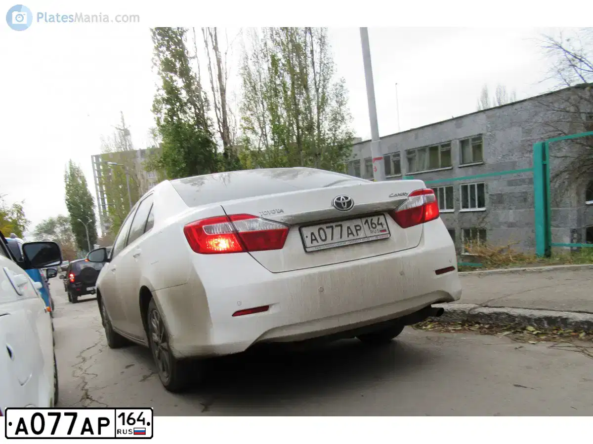 Фото автомобиля TOYOTA CAMRY, 2014 — госномер А077АР164. Цвет: БЕЛЫЙ