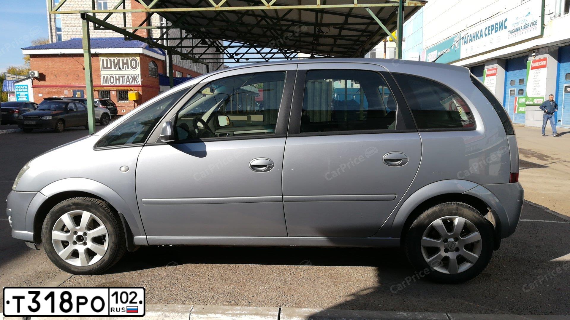 Фото автомобиля OPEL MERIVA, 2008 — госномер К130АА702. Цвет: СЕРЫЙ