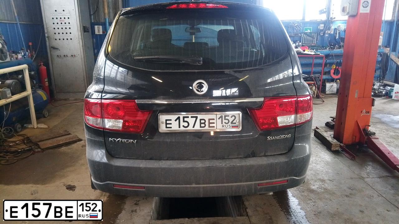 Фото автомобиля SSANGYONG KYRON, 2011 — госномер Е157ВЕ152. Цвет: ЧЕРНЫЙ