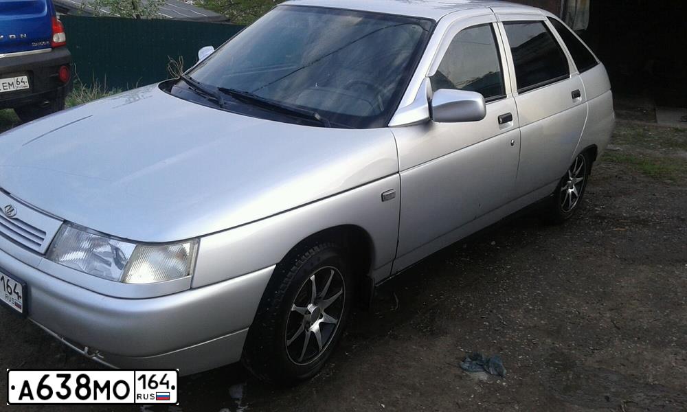 Фото автомобиля LADA 2112, 2003 — госномер Р293ХМ11. Цвет: СВЕТЛО-СЕРЕБРИСТЫЙ МЕТАЛЛ