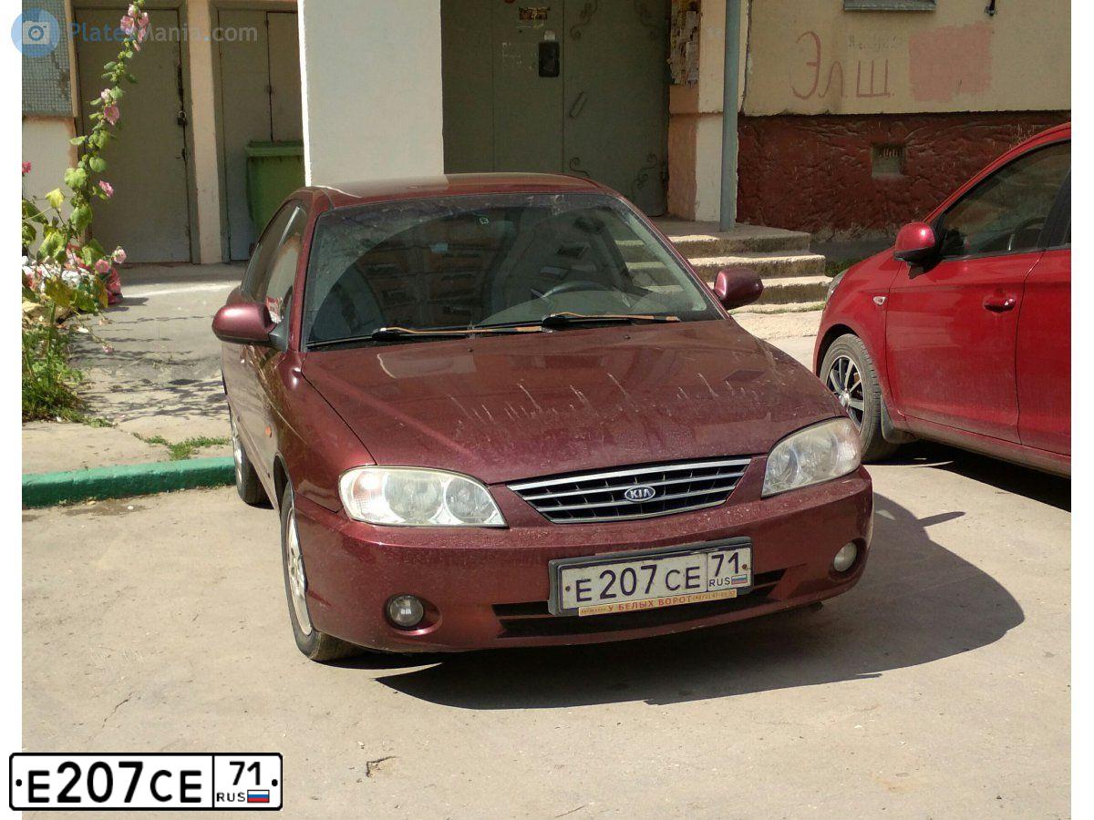 Фото автомобиля KIA SPECTRA, 2006 — госномер Е207СЕ71. Цвет: Красный