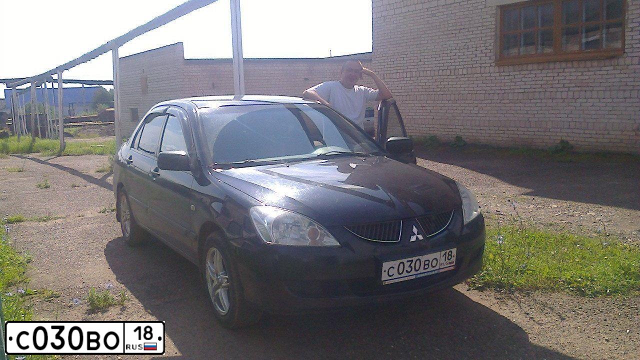 Фото автомобиля MITSUBISHI LANCER, 2005 — госномер С030ВО18. Цвет: ЧЕРНЫЙ
