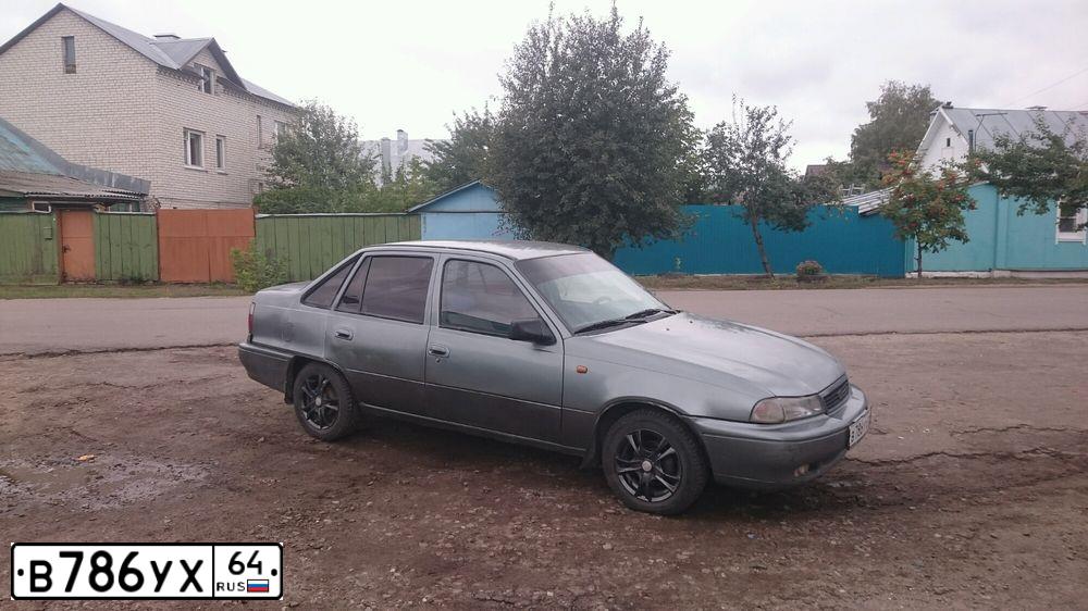 Фото автомобиля DAEWOO NEXIA, 1996 — госномер В786УХ64. Цвет: СЕРЫЙ