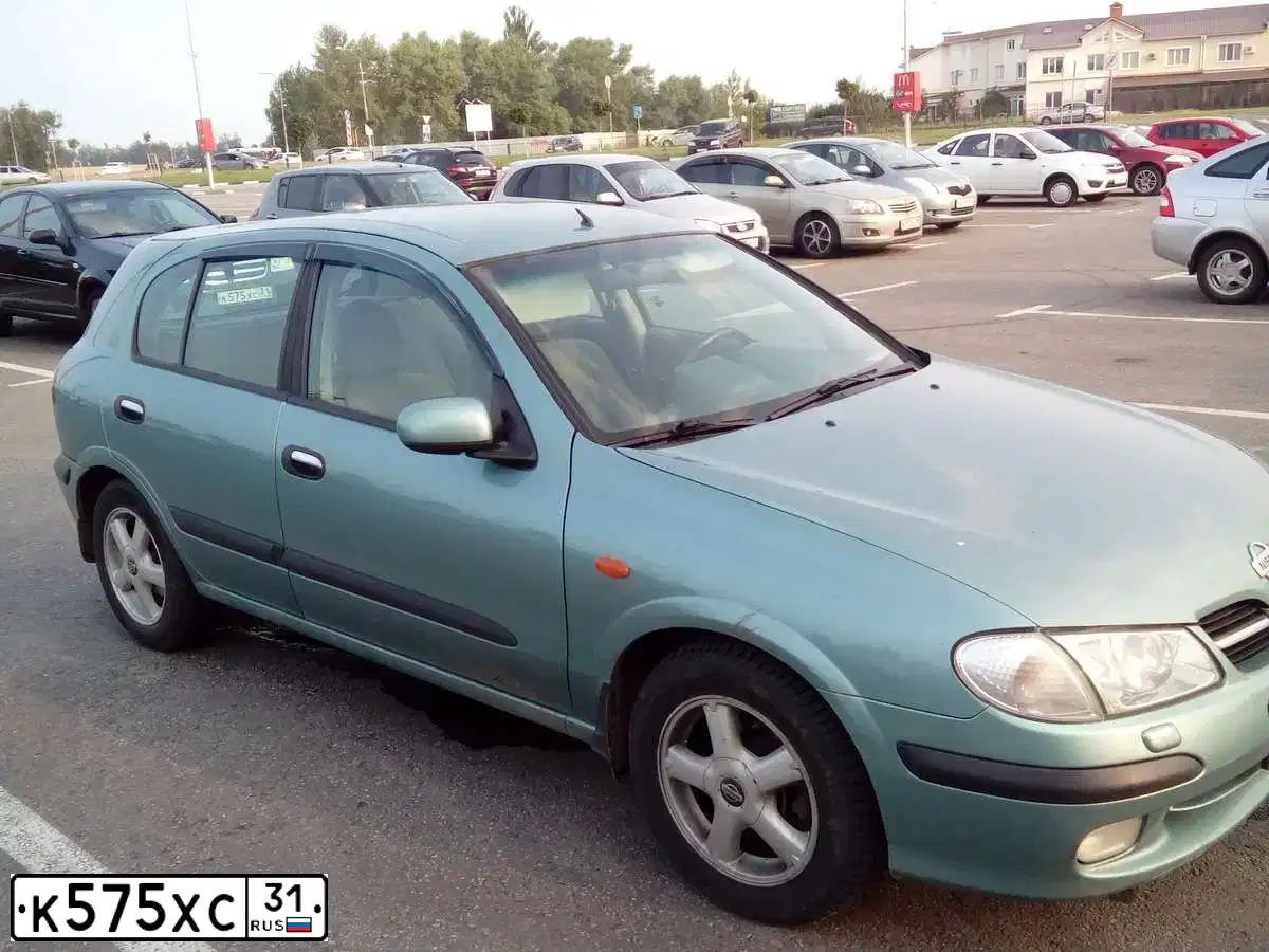 Фото автомобиля HYUNDAI IX35, 2011 — госномер К575ХС31. Цвет: СЕРЕБРИСТЫЙ