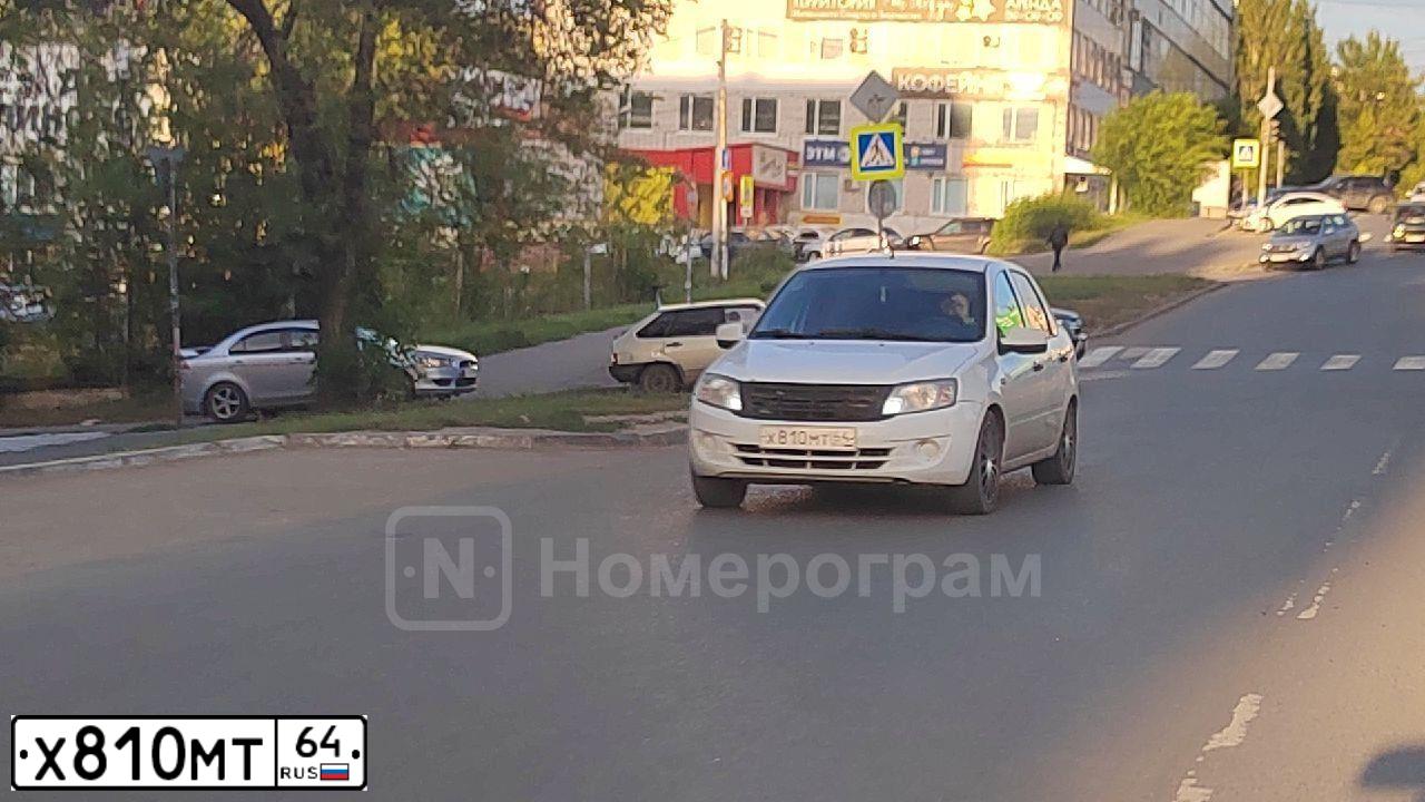 Фото автомобиля LADA 2190 GRANTA, 2013 — госномер Х810МТ64. Цвет: Белый
