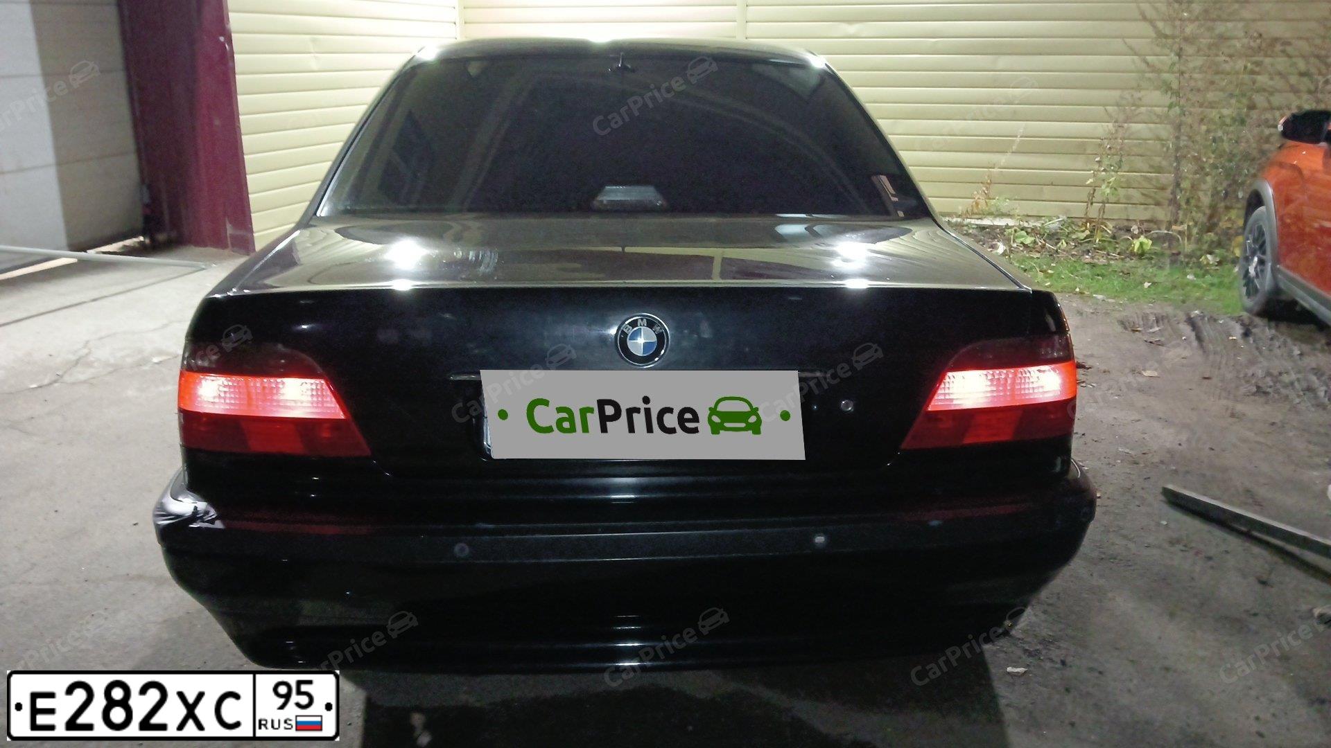 Фото автомобиля BMW 740, 1998 — госномер Е223ВС550. Цвет: ЧЕРНЫЙ
